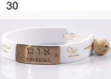Carica l'immagine nel visualizzatore di Gallery, 30) 'OMAE’EL - 18 a 23 Agosto, bracciale caucciù piastrina bronzo