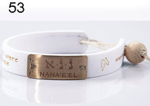 Carica l'immagine nel visualizzatore di Gallery, 53) NANA’E’EL - 12 a 17 Dicembre, bracciale caucciù piastrina bronzo
