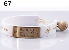Carica l'immagine nel visualizzatore di Gallery, 67) ’AY‘A’EL - 19 a 24 Febbraio, bracciale caucciù piastrina bronzo