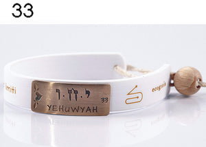 33) YEHUWYAH - 3 a 8 Settembre, bracciale caucciù piastrina bronzo