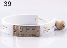 Carica l&#39;immagine nel visualizzatore di Gallery, 39) RAHA‘E’EL - 4 a 8 Ottobre, bracciale caucciù piastrina bronzo
